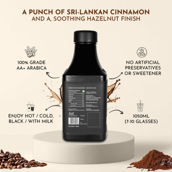 Back view of Cohoma Cinnamon Hazelnut Cold Brew Coffee bottle, highlighting AA+ grade Arabica beans, no artificial preservatives, and 1050ml size.