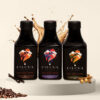 Cohoma Cold Brew Coffee trio featuring French Vanilla, Original, and Cinnamon flavors in ready-to-drink bottles.