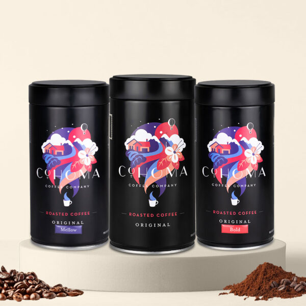 Front view of three Cohoma Original Roasted Coffee cans, featuring Mellow, Original, and Bold blends, in sleek black packaging.