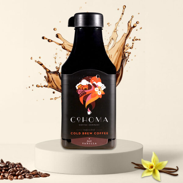 “Cohoma French Vanilla Cold Brew Coffee bottle front with splashing coffee, featuring ready-to-drink cold brew with aromatic vanilla flavor.