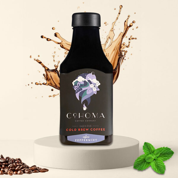 Cohoma Organic Peppermint Cold Brew Coffee bottle front with splashing coffee, featuring ready-to-drink cold brew with a refreshing peppermint flavor.