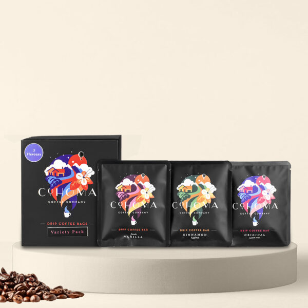 Cohoma Signature Flavour Trio Drip Coffee Bag with accompanying box, showcasing the vibrant packaging design with fresh coffee.