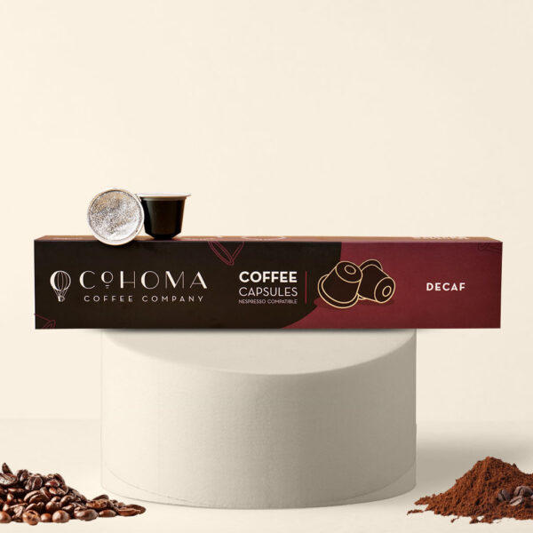 Front view of Cohoma Decaf Coffee Capsules, featuring Nespresso-compatible pods in sleek packaging, highlighting the decaf blend with 0% caffeine and 100% taste.