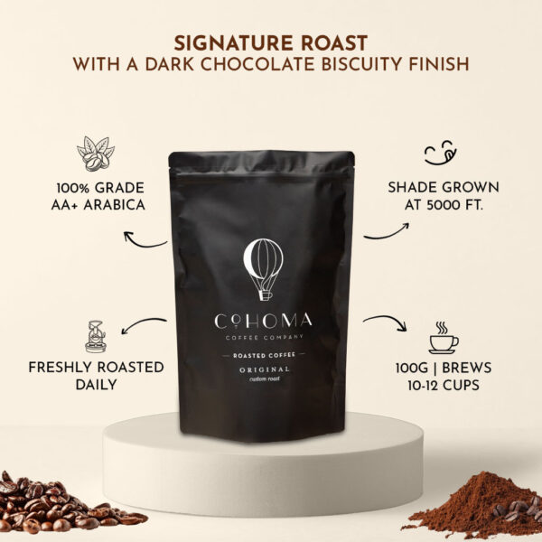 Front view of Cohoma Coffee Custom Roast pack with information about its signature dark chocolate biscuity finish, crafted with AA+ grade Arabica beans shade-grown at 5000 ft.