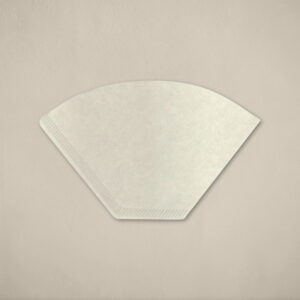 Kalita paper filter NK 102 for flat-bottom pour-over coffee drippers, made from high-quality material, displayed on a neutral beige background